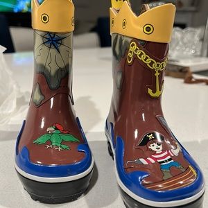 Kidorable rain boots. New. Never worn.